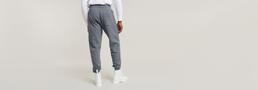 pantalones deportivos holgados y cónicos esenciales