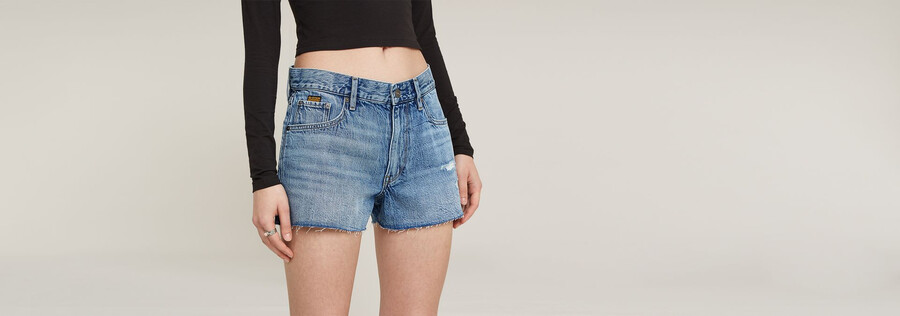 pantalones cortos de mezclilla auténticos con borde sin rematar